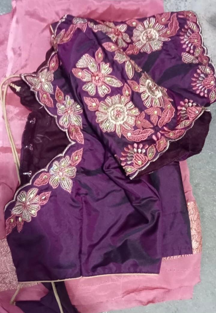 Purple bridal blouse with elaborate gold floral maggam work embroidery