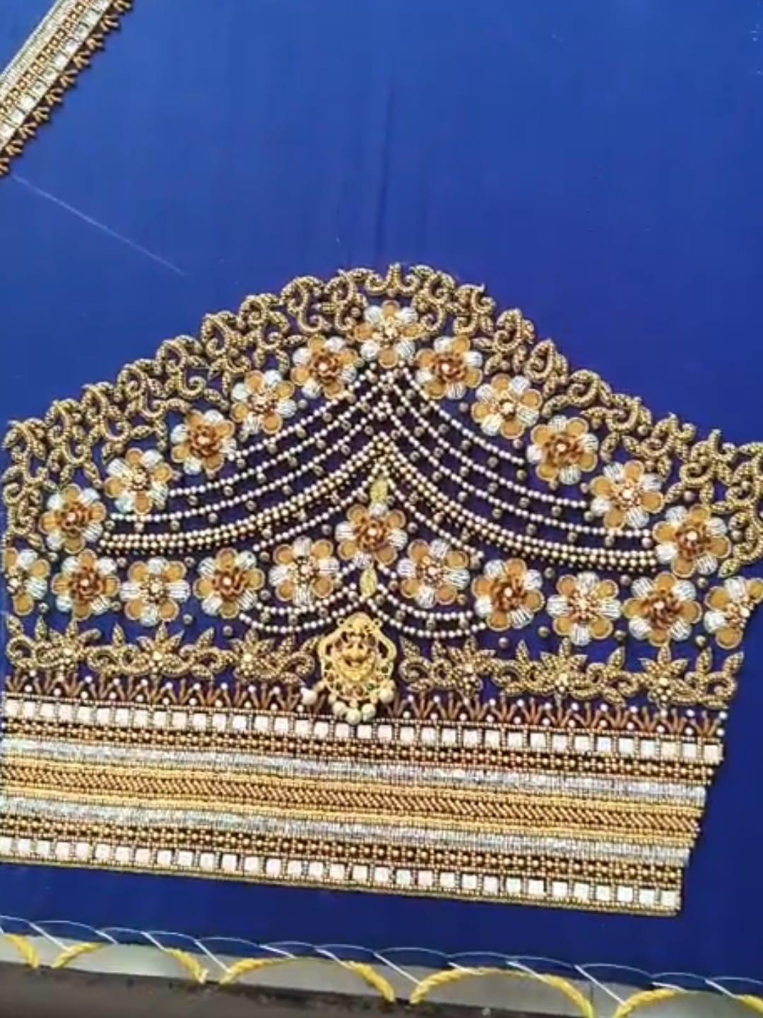 Royal blue bridal blouse with gold floral maggam and pearl beadwork