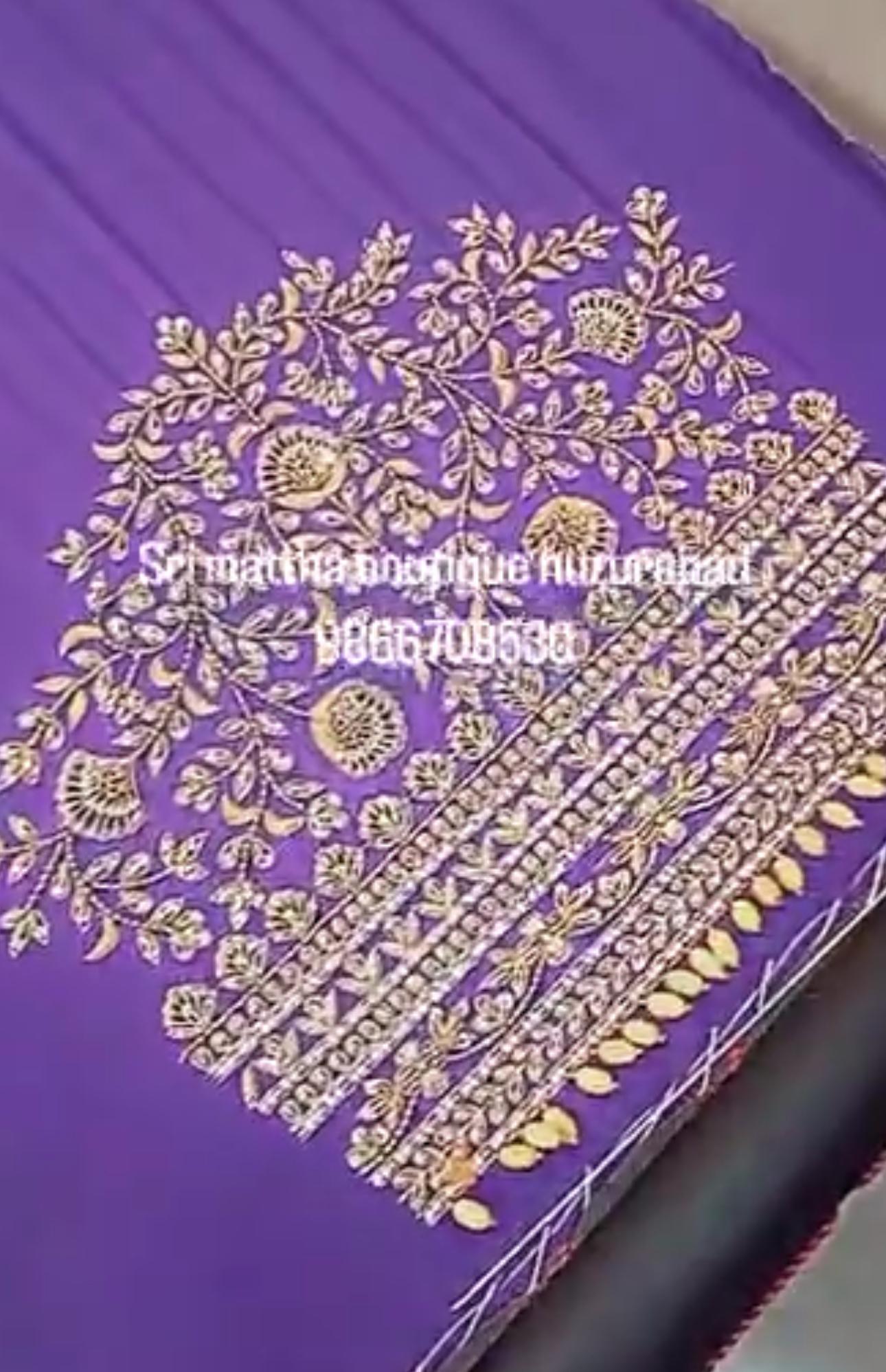Purple saree with gold zari embroidery and floral maggam work