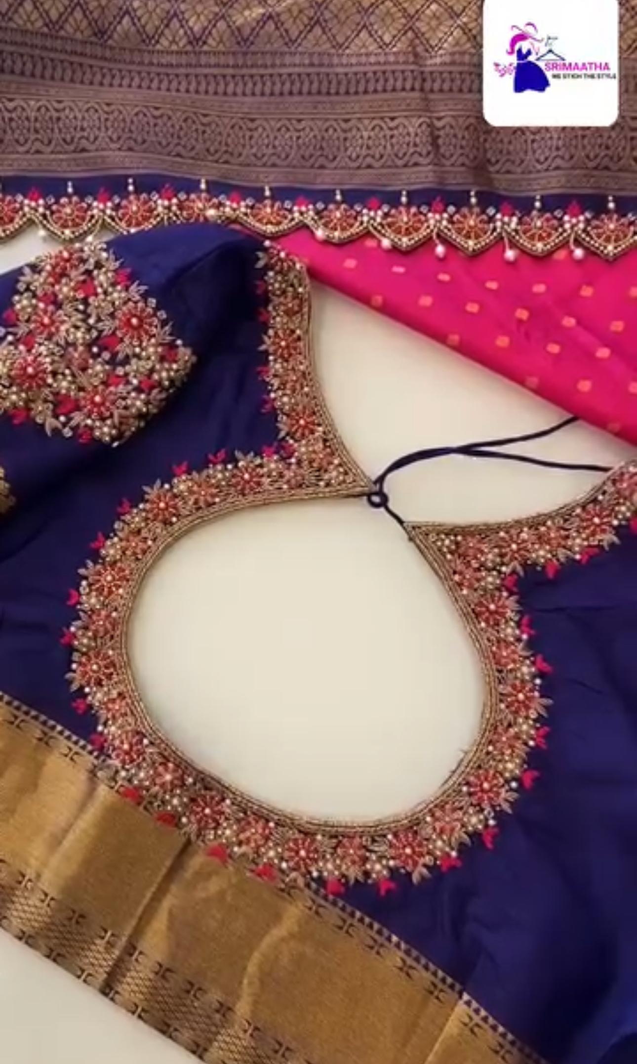 Navy blue bridal blouse with dense gold and red maggam work embroidery