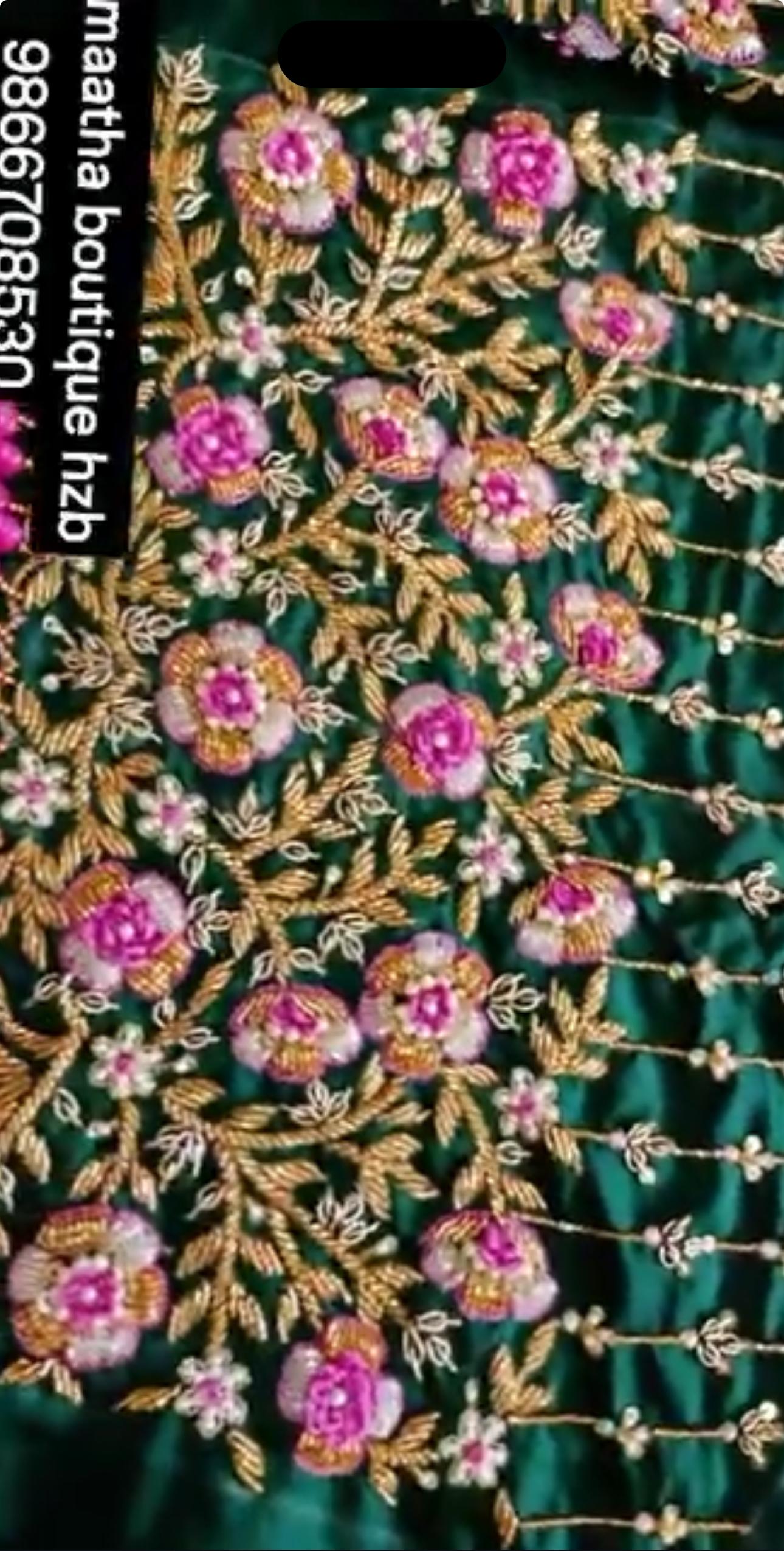 Green designer boutique fabric with magenta floral zari embroidery