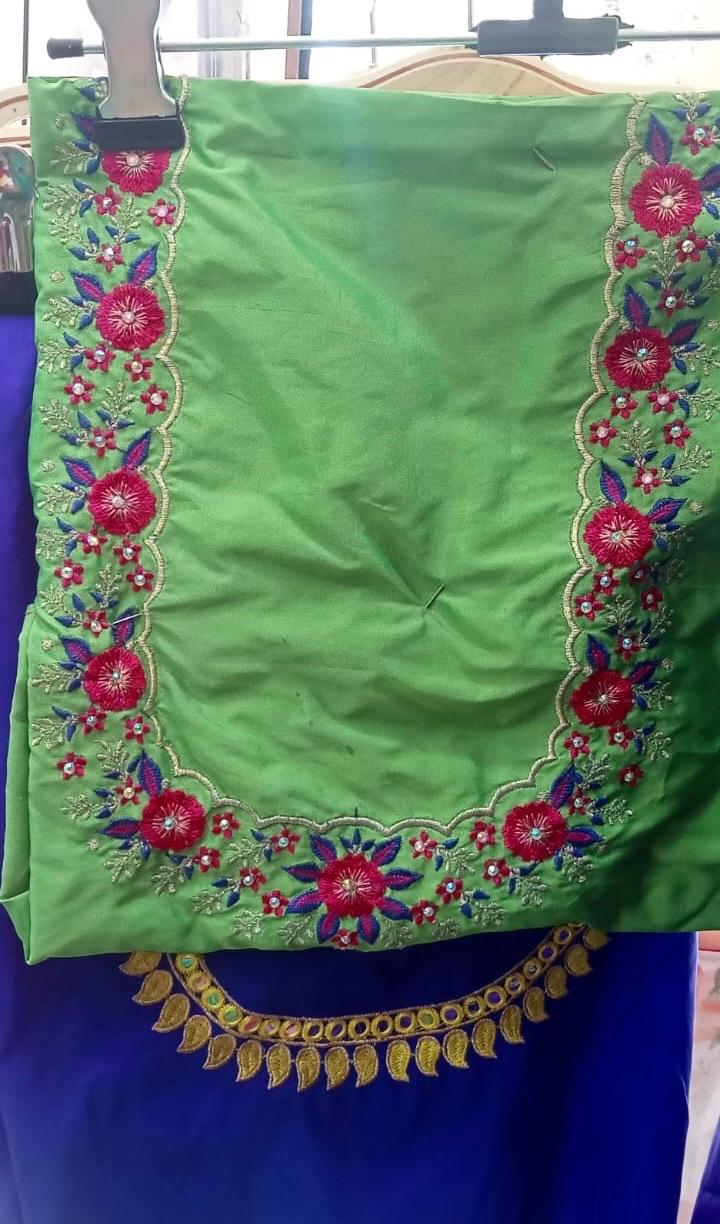 Lime green blouse with floral maggam work embroidery border and gold leaf lace
