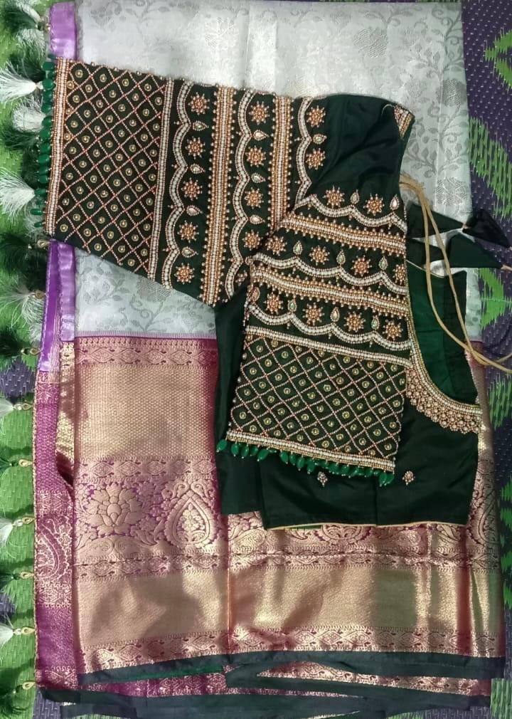Black silk saree with gold zari embroidery and ornate blouse