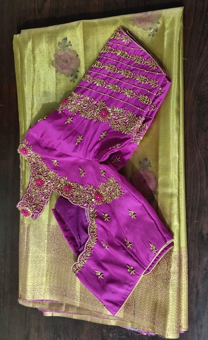 Purple silk blouse with ornate gold zari embroidery and floral maggam work