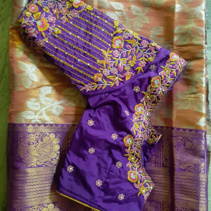Purple silk blouse with elaborate gold zari and floral maggam work embroidery