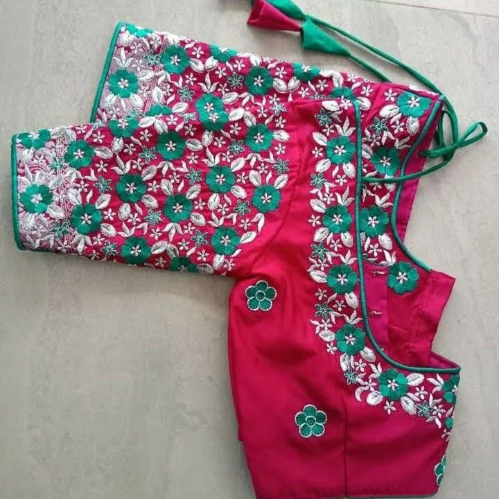 Pink and green floral blouse with embroidered trim and tie-up closure