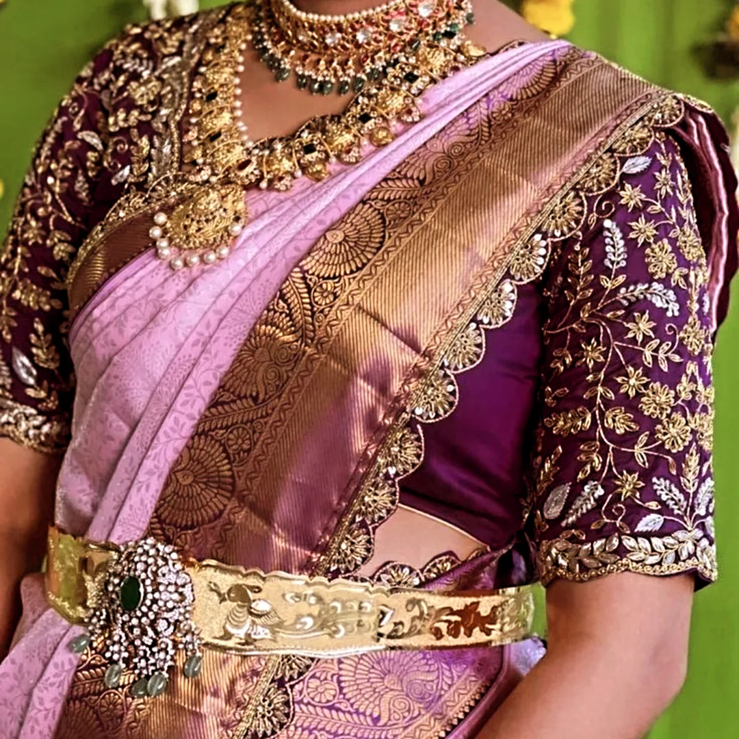 Purple bridal blouse with gold zari embroidery and maggam work