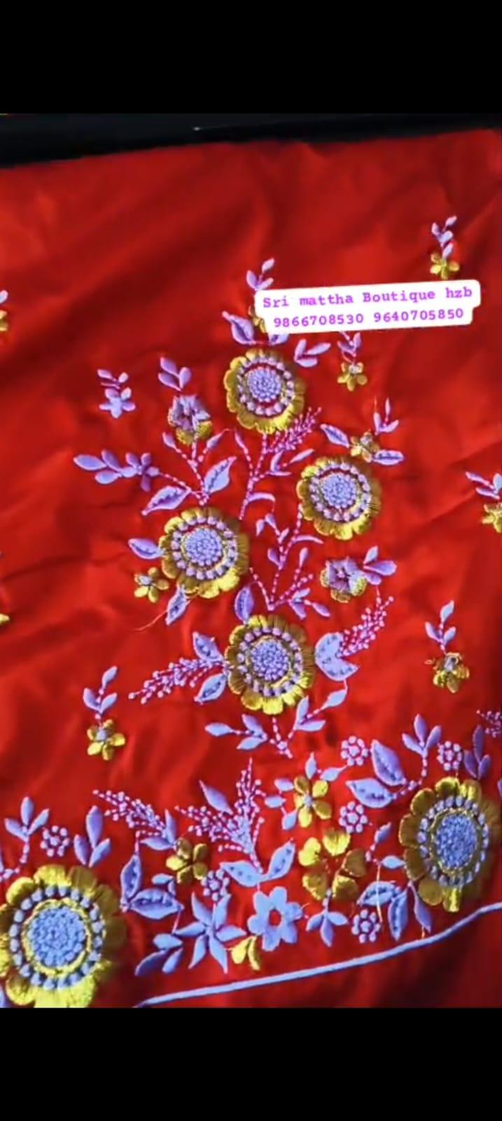 Red saree with purple floral maggam work and gold embroidery