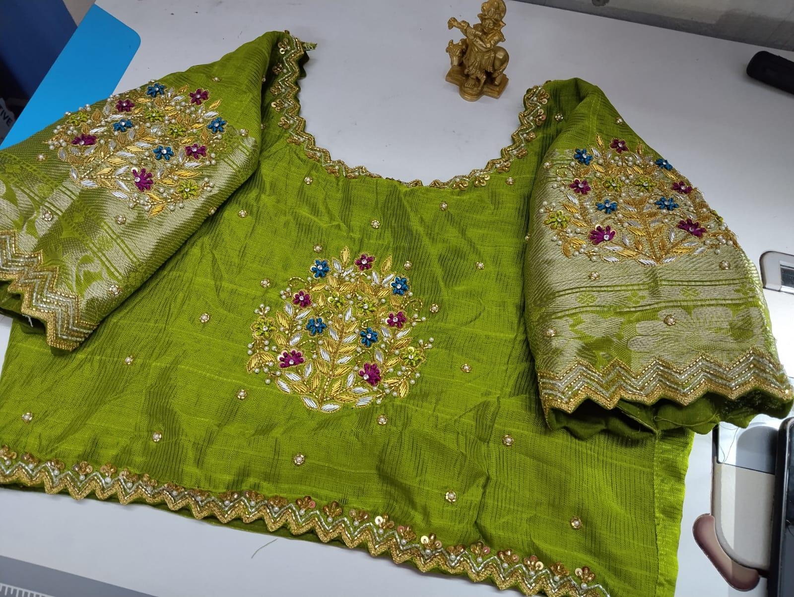 Lime green bridal blouse with gold zari and floral maggam work