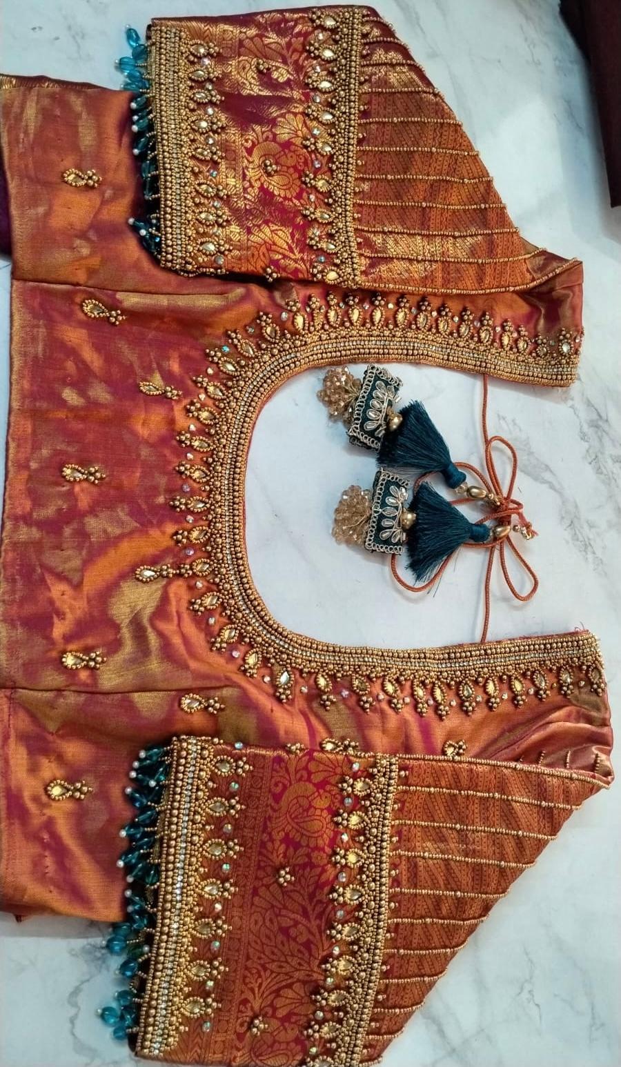 Maroon silk blouse with gold zari and beadwork embroidery