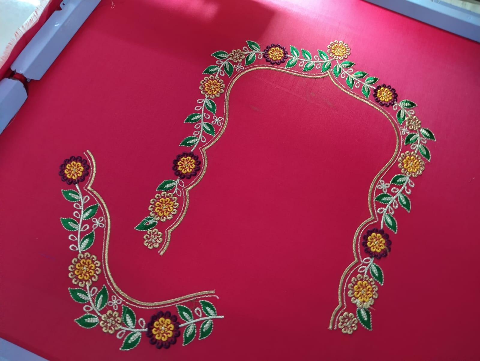 Pink blouse with floral maggam work embroidery design