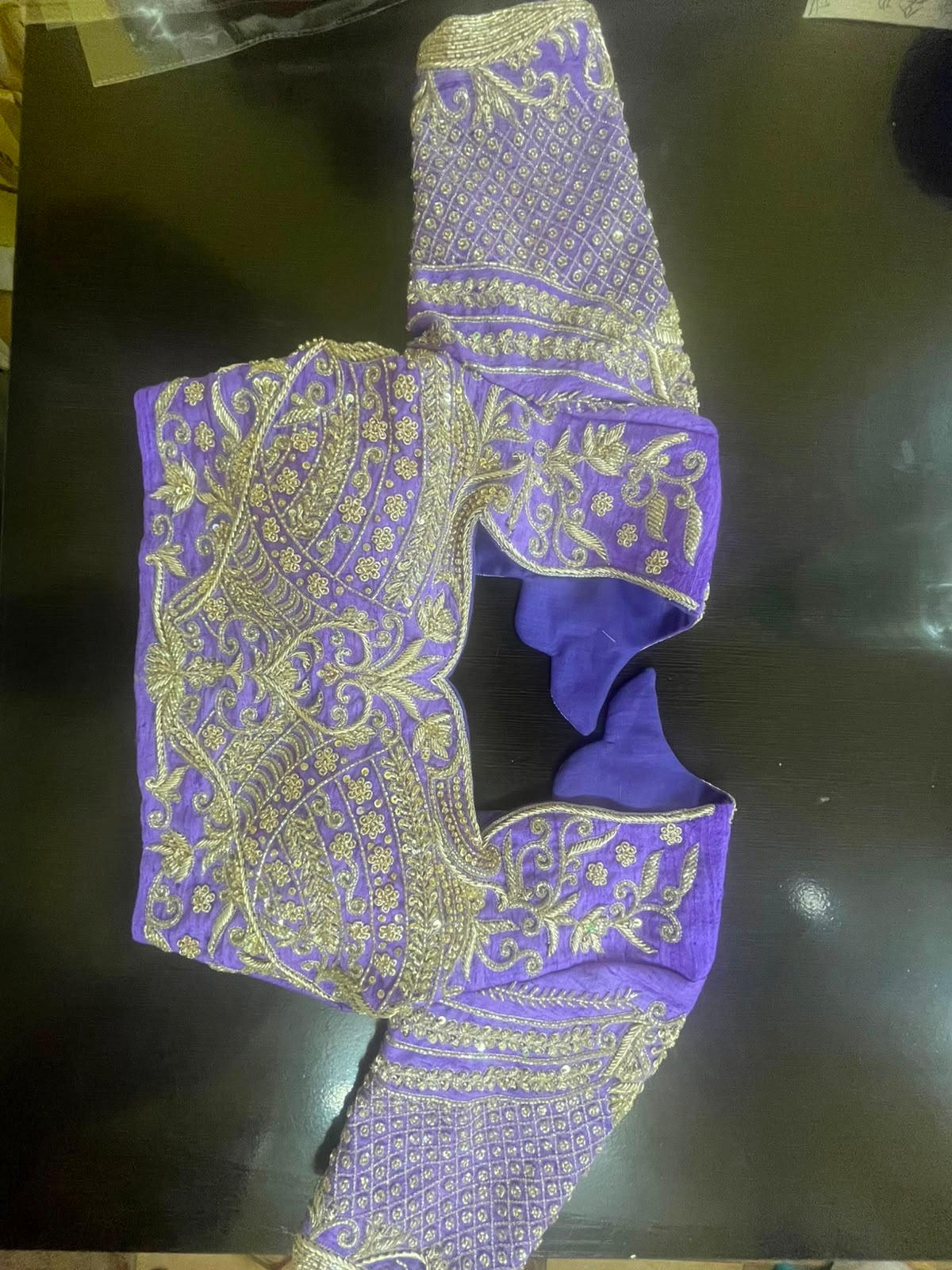 Purple blouse with gold zari embroidery and maggam work detailing