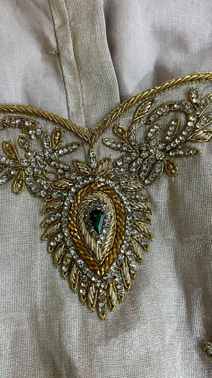 Cream blouse with gold leaf embroidery and emerald stone detail