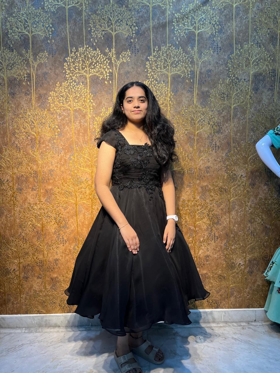 Black party wear gown with embroidered bodice and flowing skirt