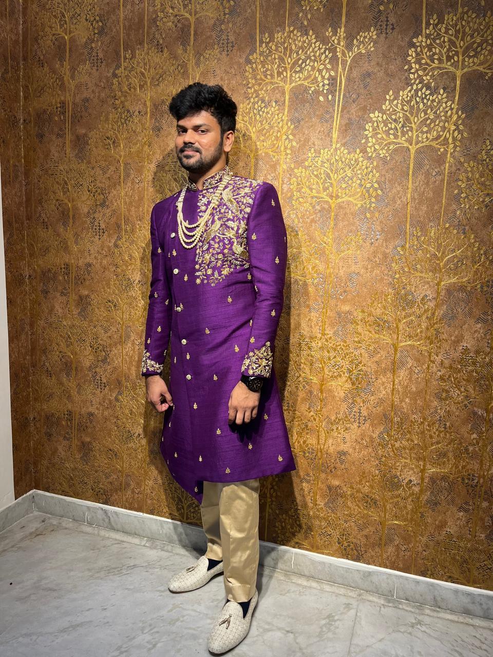 Purple kurta with gold zari embroidery and cream pants ensemble