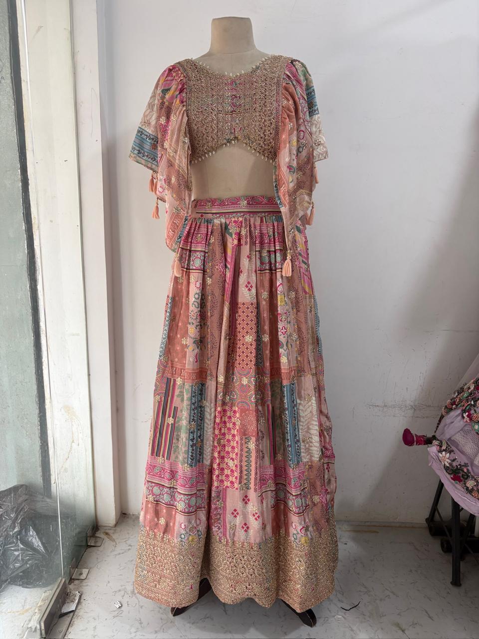 Pink patchwork lehenga with beaded blouse and printed dupatta