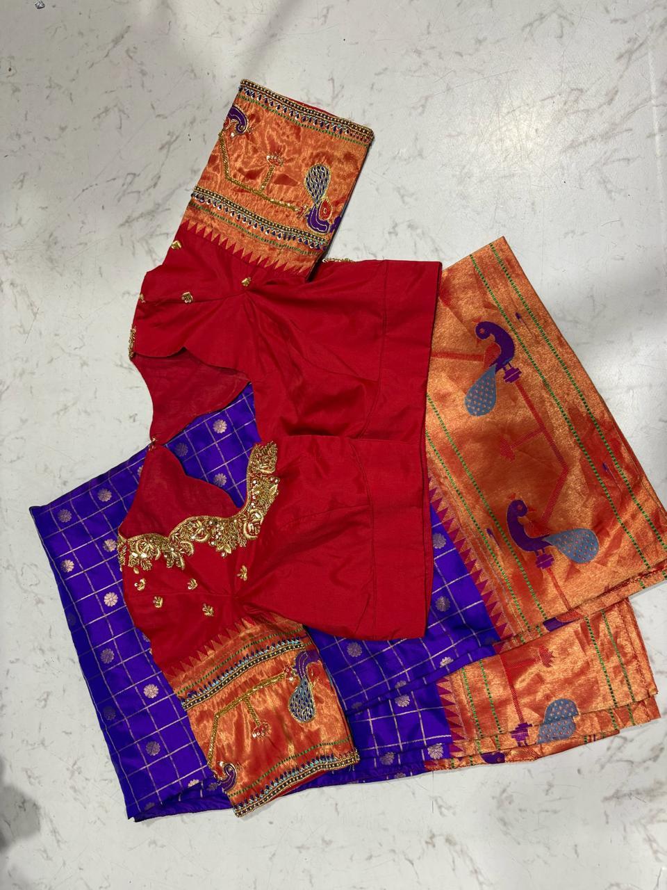 Red silk blouse with blue peacock saree and orange gold border