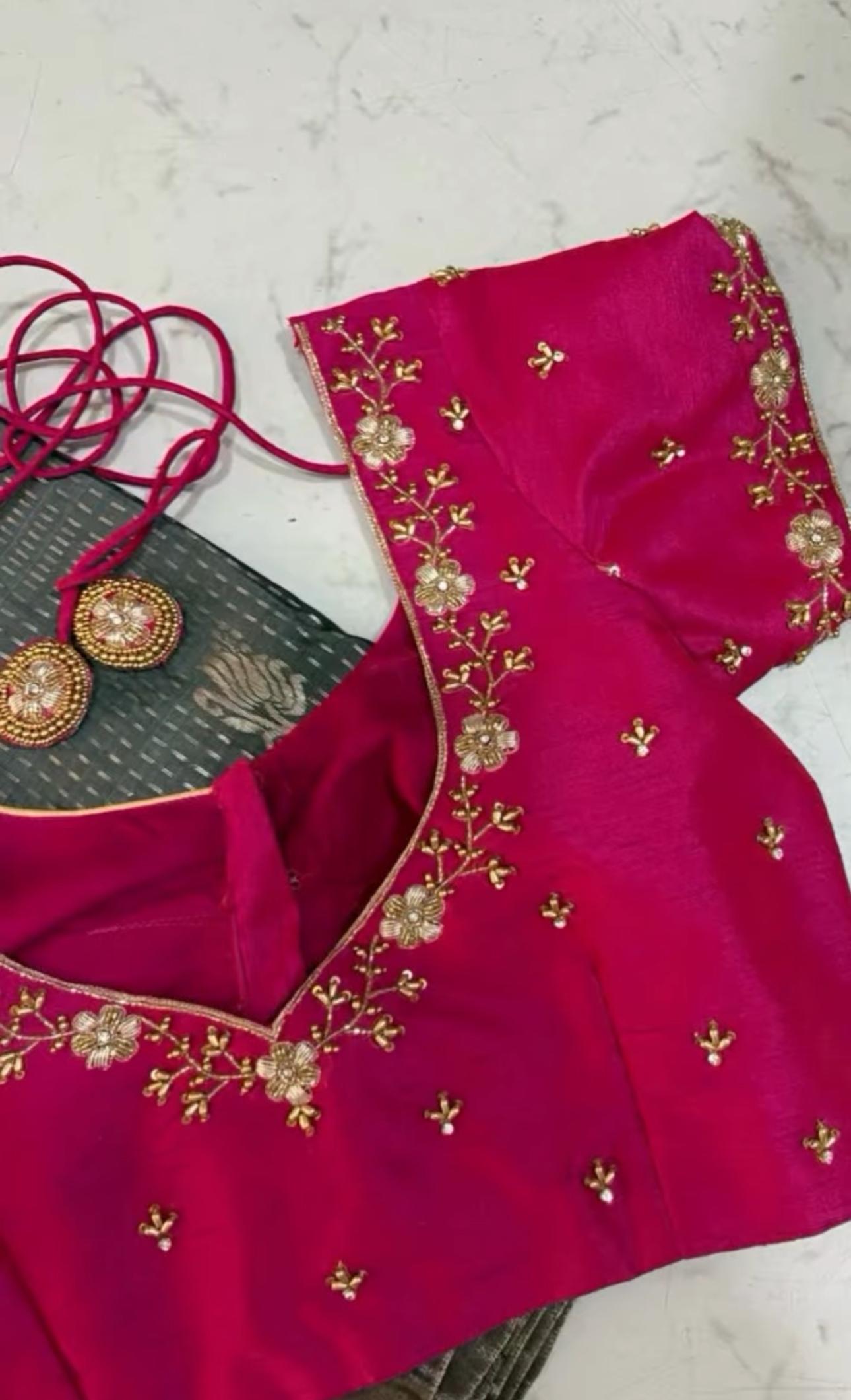 Magenta bridal blouse with gold zari floral embroidery and beadwork