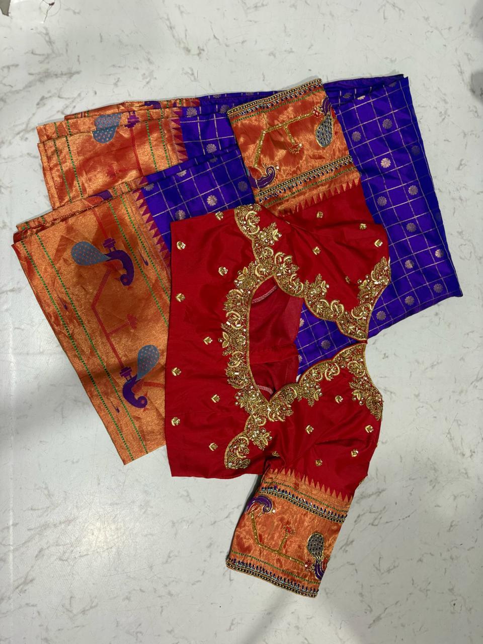 Red bridal blouse with gold zari embroidery and blue silk saree set
