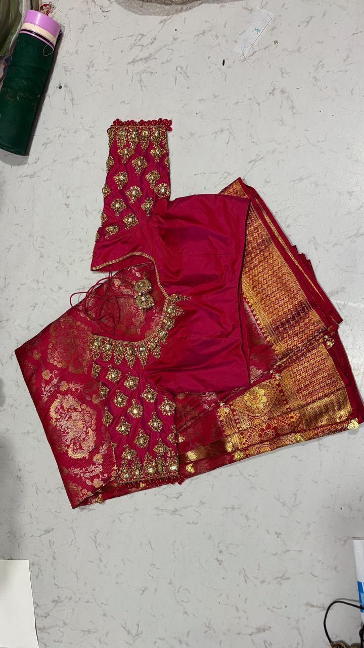 Red silk saree with gold zari embroidery and patterned blouse