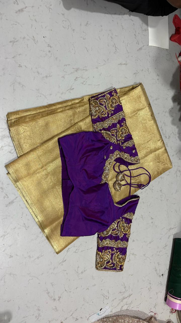 Purple silk blouse with gold zari embroidery and traditional maggam work