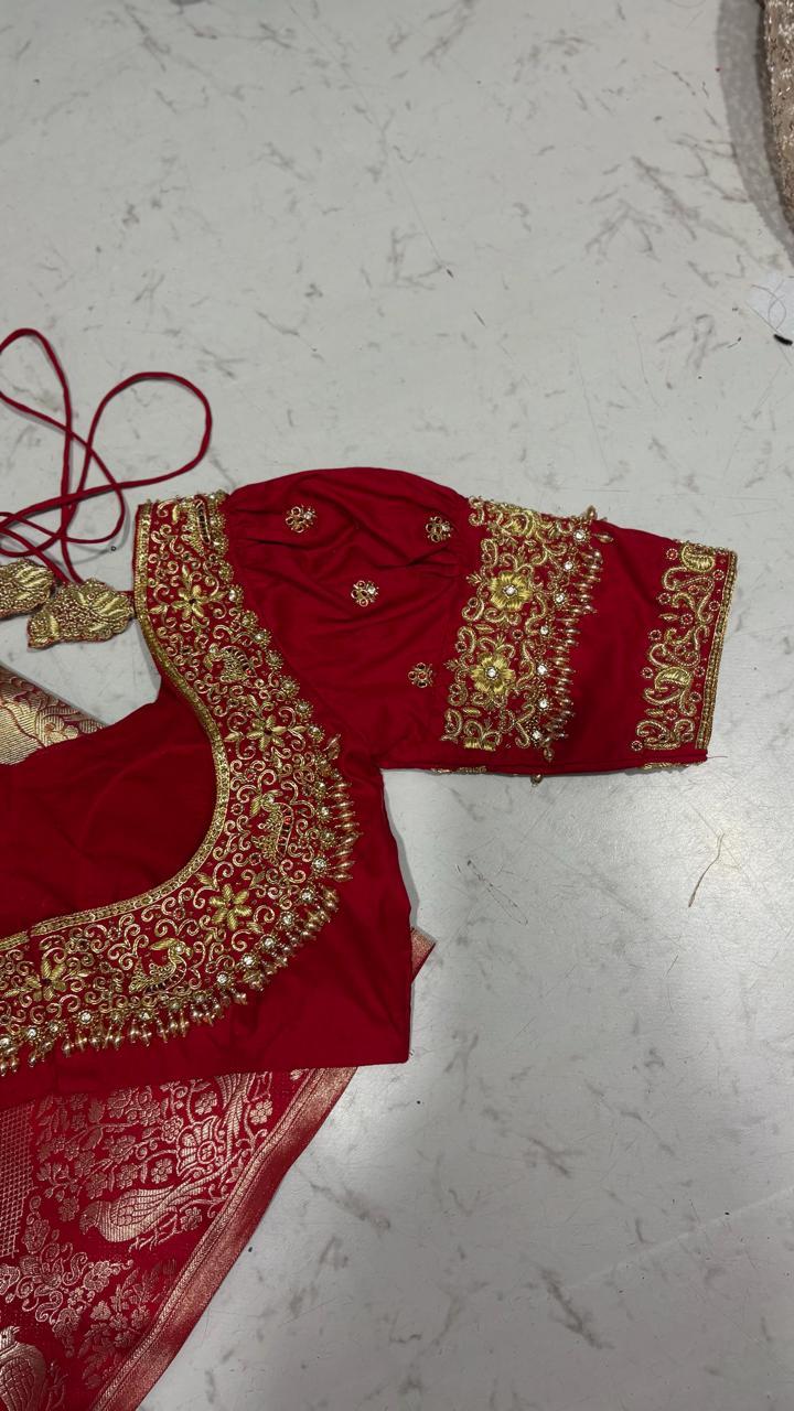 Red bridal blouse with gold zari embroidery and ornate borders