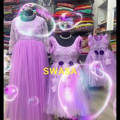 Purple tulle gown with sequin embellishments and glowing neon accents