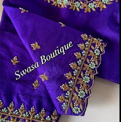 Royal purple saree with ornate gold embroidery border details