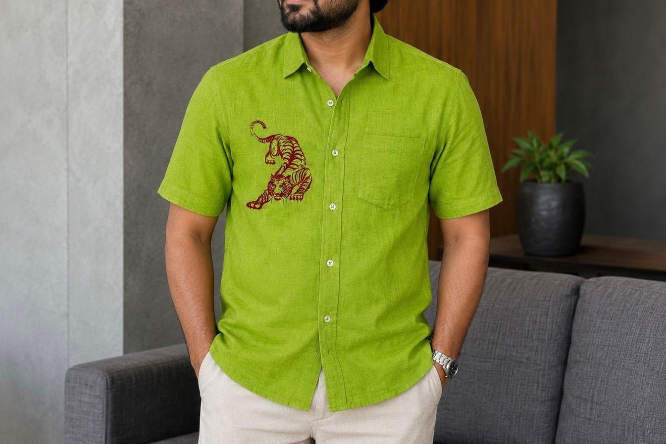 Lime green short-sleeve shirt with maroon tiger embroidery detail