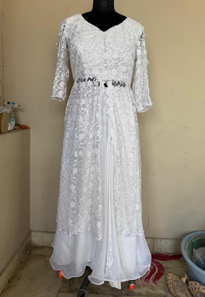 White lace evening gown with three-quarter sleeves and beaded waist