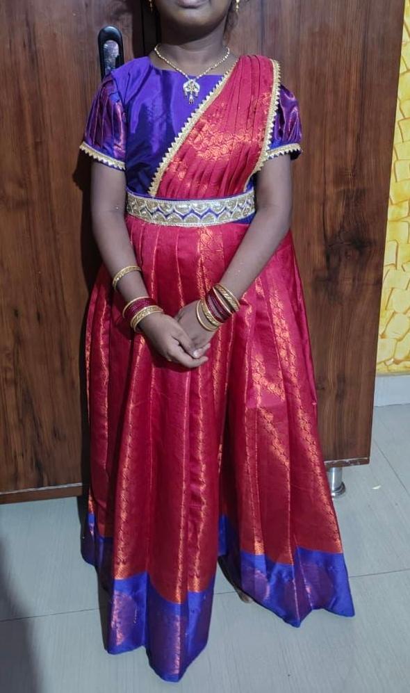 Maroon silk half saree with purple blouse and gold zari borders