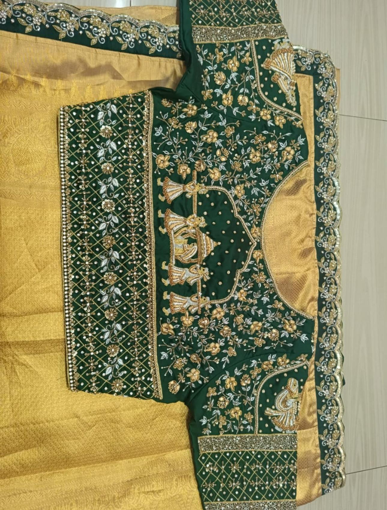 Green Pattu blouse with gold zari floral embroidery and peacock motifs