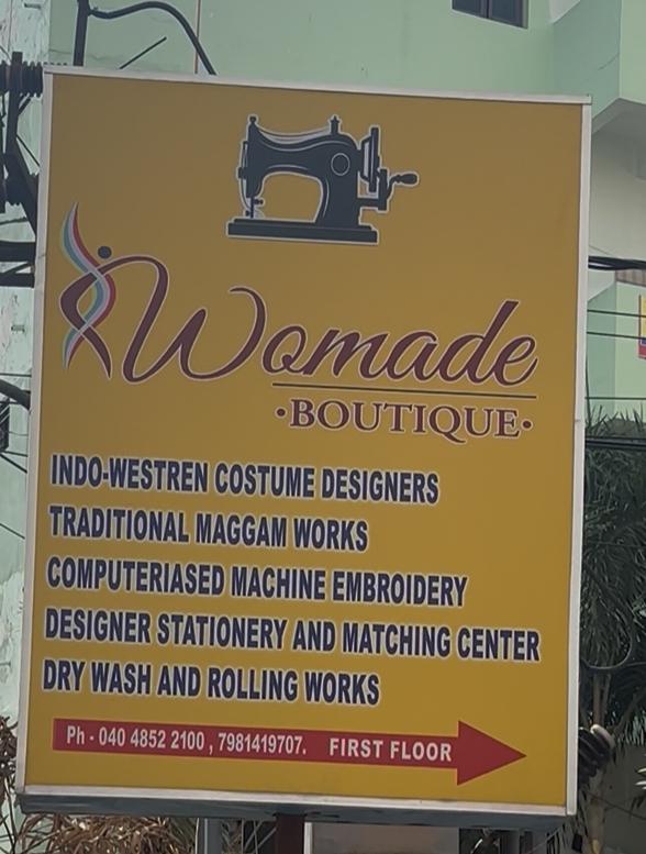 Womade Boutique Logo