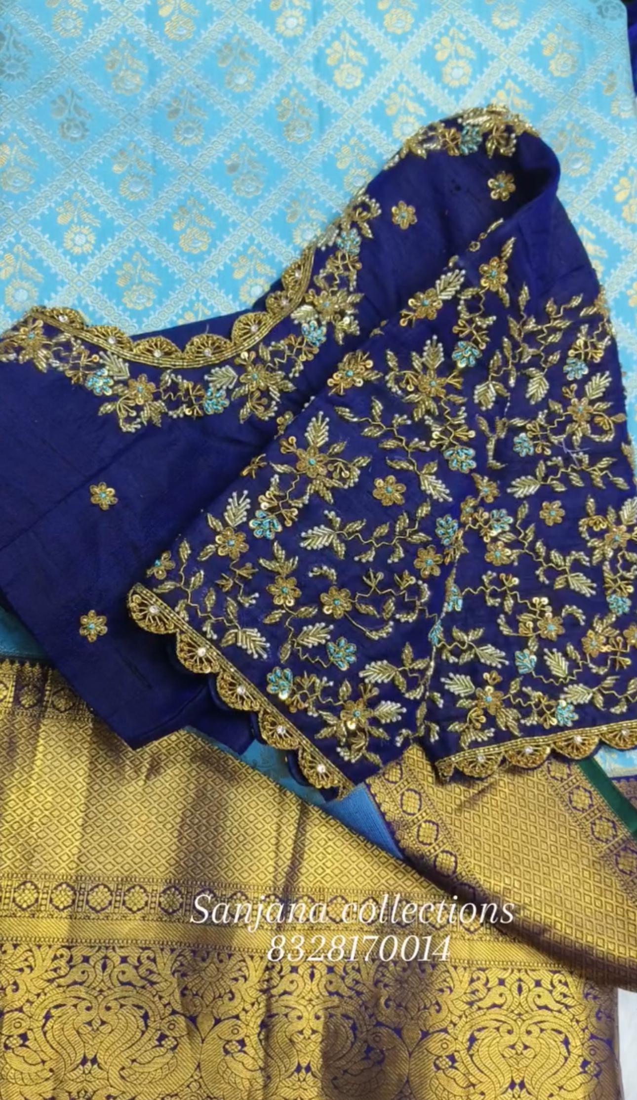 Royal blue bridal maggam work blouse with floral embroidery