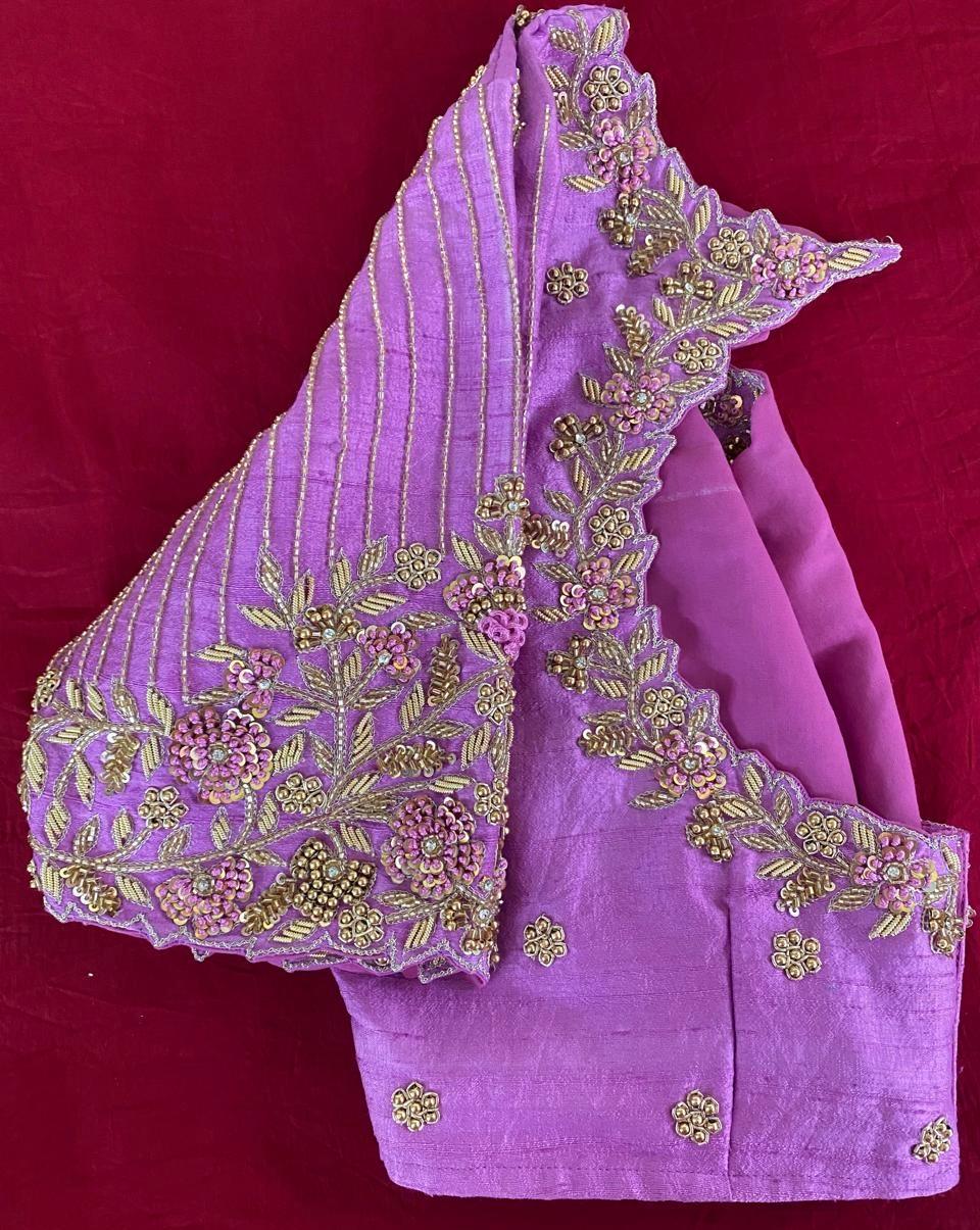 Purple bridal maggam work blouse with floral hand embroidery and designer sleeve detailing by Deepika Boutique Hanamkonda
