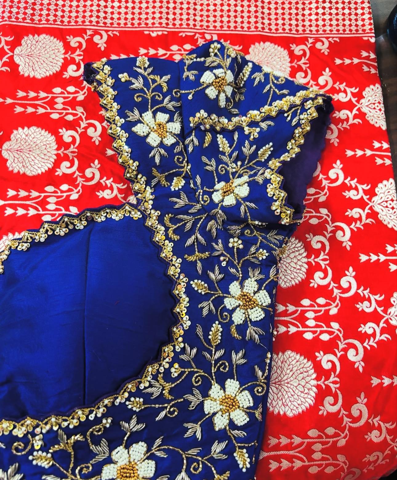 Blue bridal blouse with heavy floral maggam work embroidery