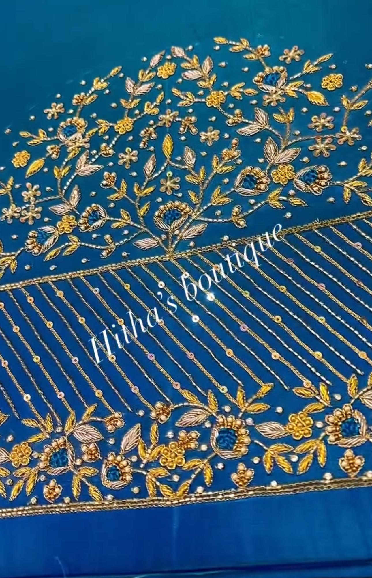 Blue blouse border with traditional floral maggam work