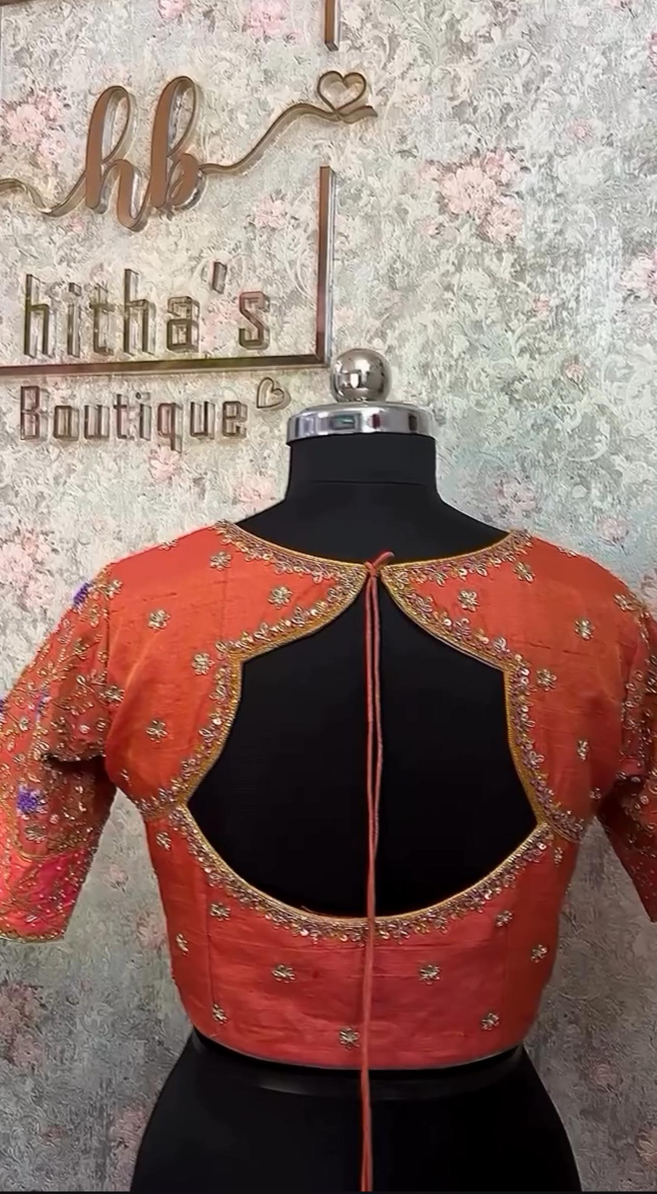 Orange blouse with simple maggam work back design