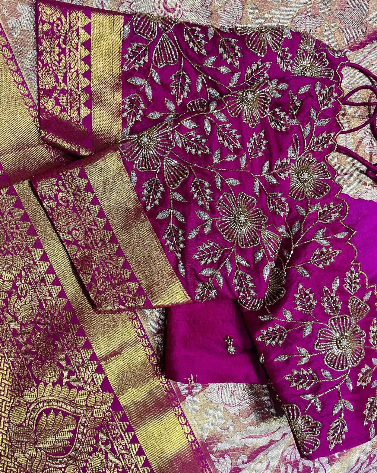 Pink bridal blouse with floral maggam work paired with silk saree