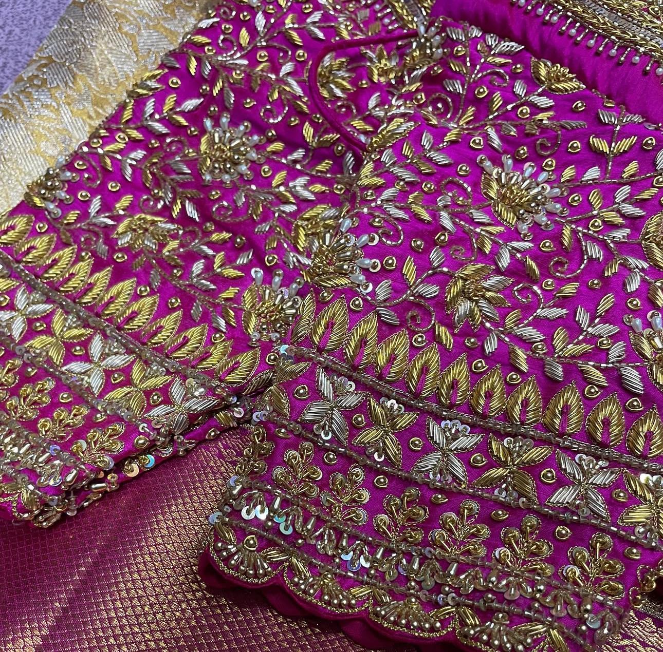 Pink bridal blouse with heavy floral maggam work embroidery