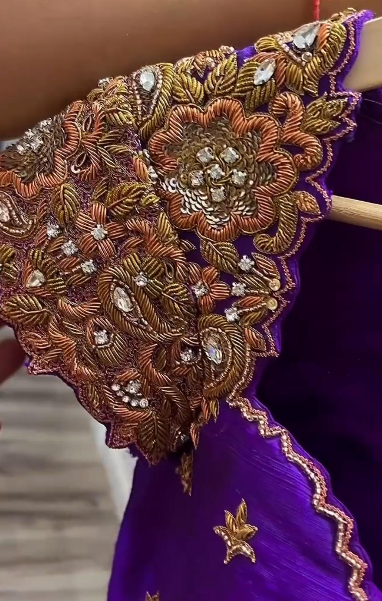 Purple blouse sleeve with heavy floral maggam work embroidery