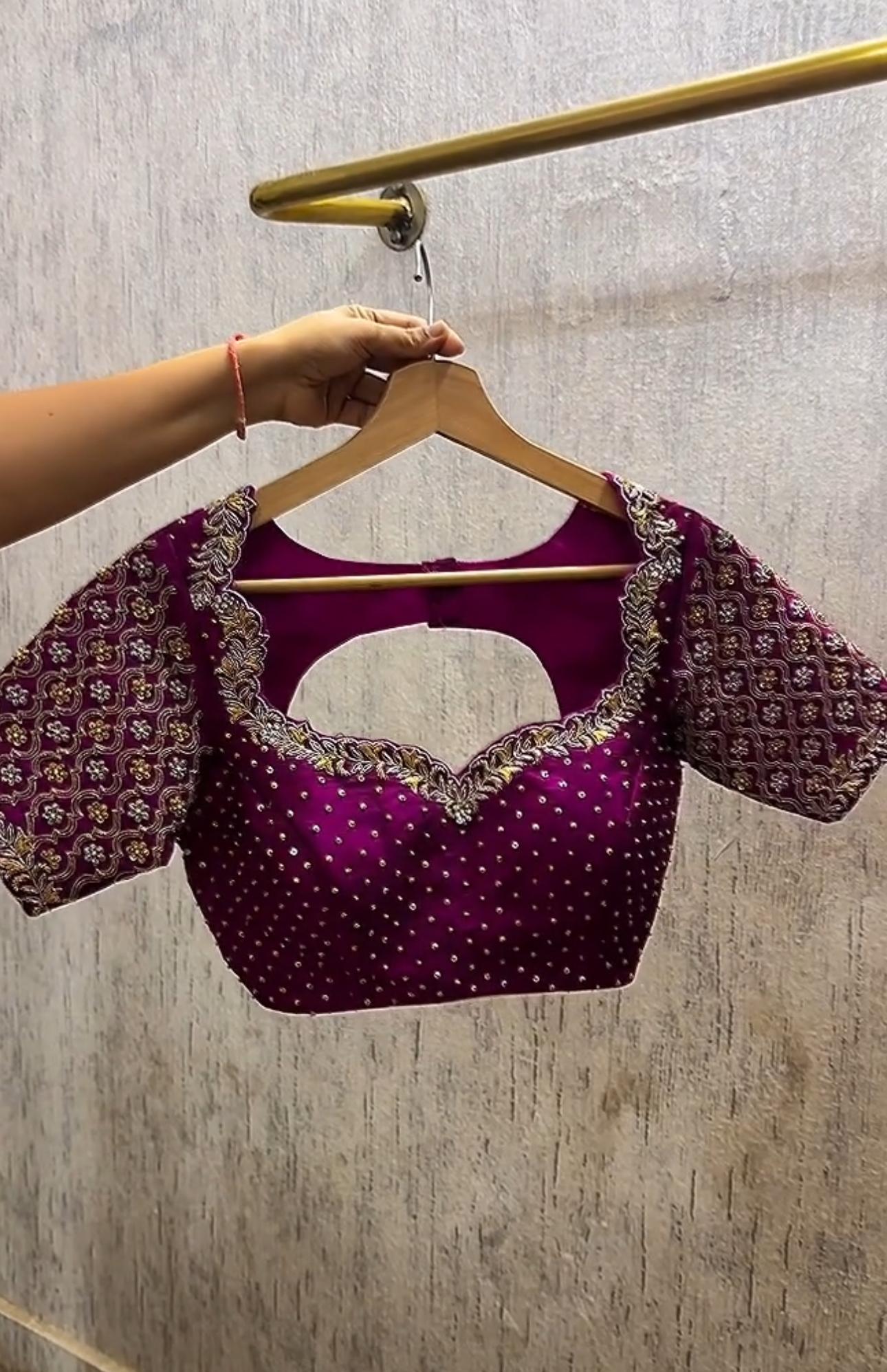 Purple bridal blouse with rich maggam work embroidery