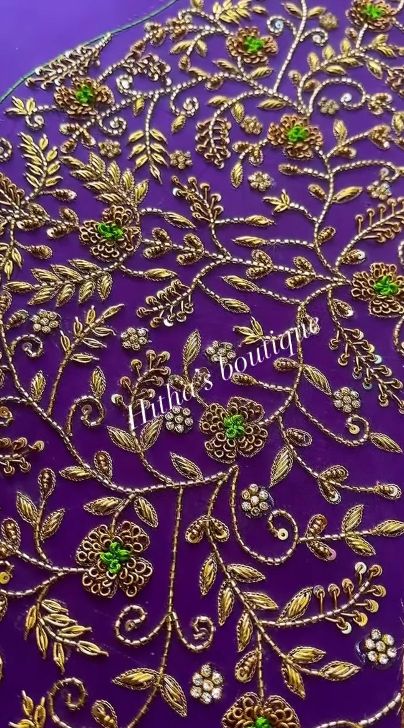 Purple blouse with intricate floral maggam work embroidery