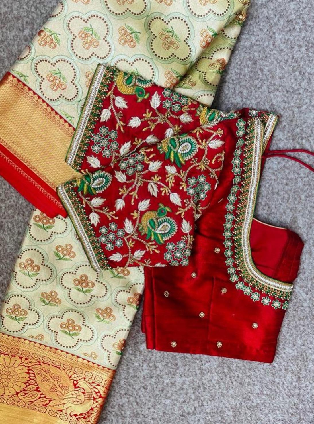 Red bridal blouse with heavy floral maggam work embroidery