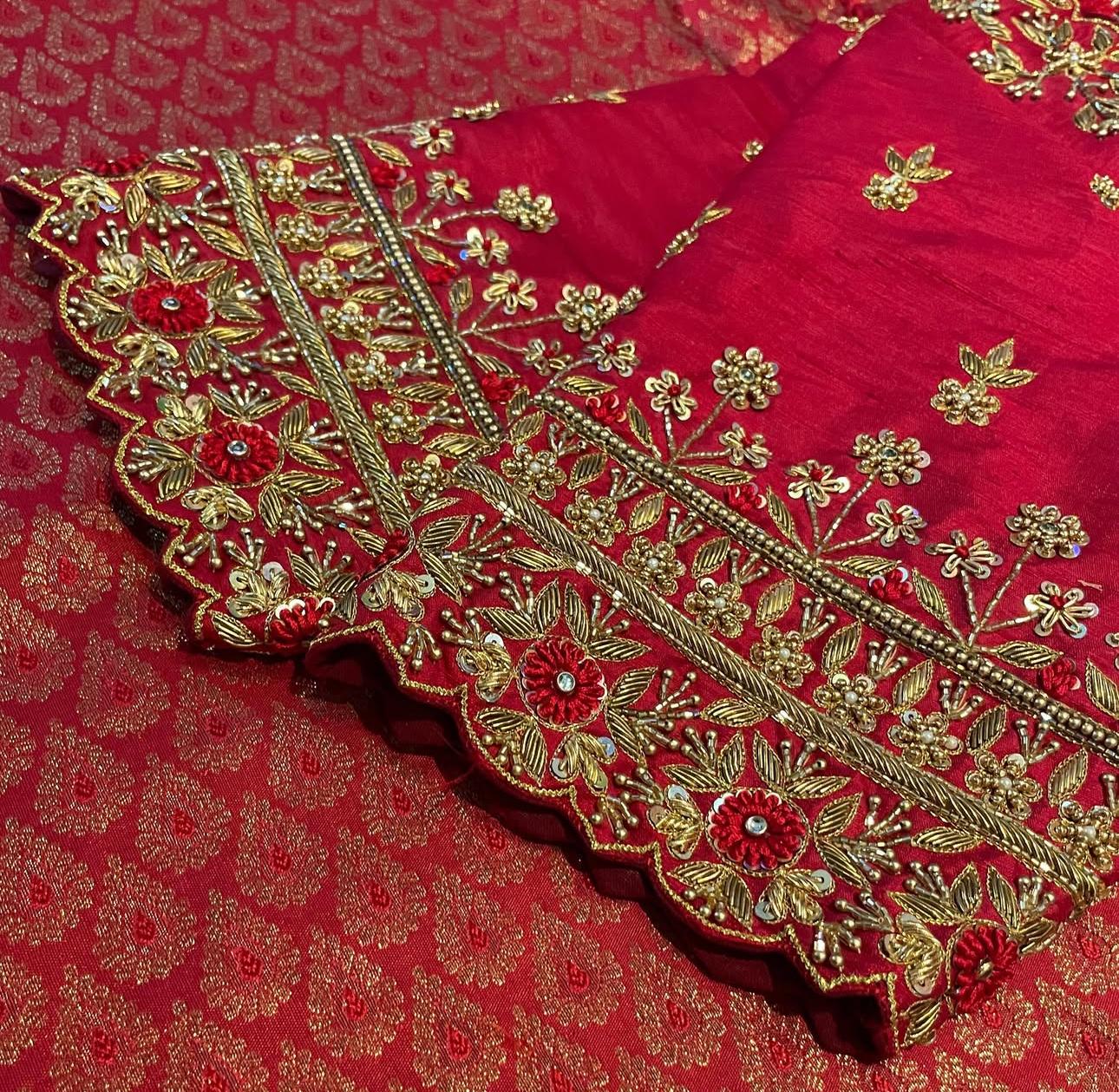 Red blouse border with traditional floral maggam work