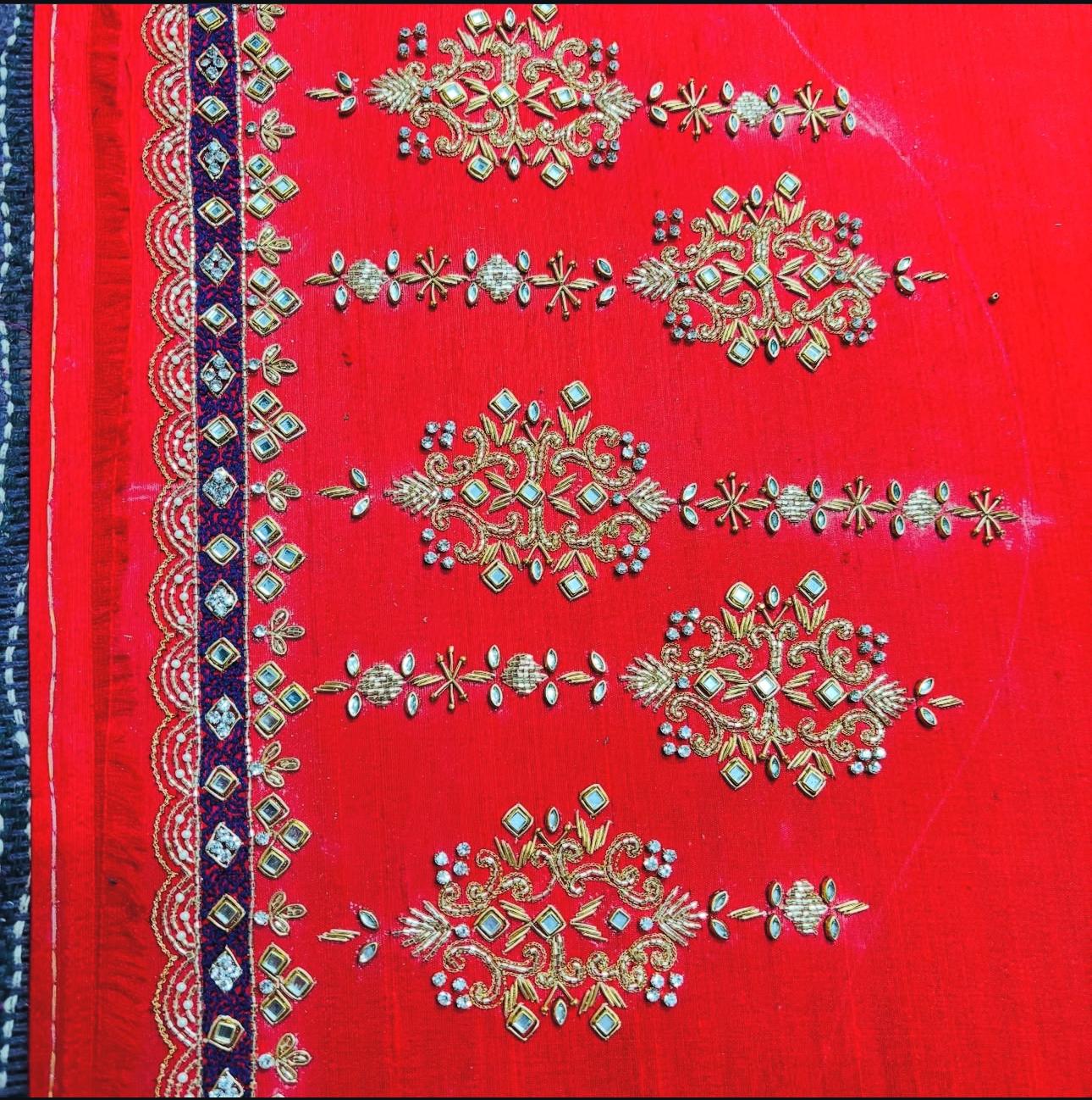 Red saree border with traditional floral maggam work