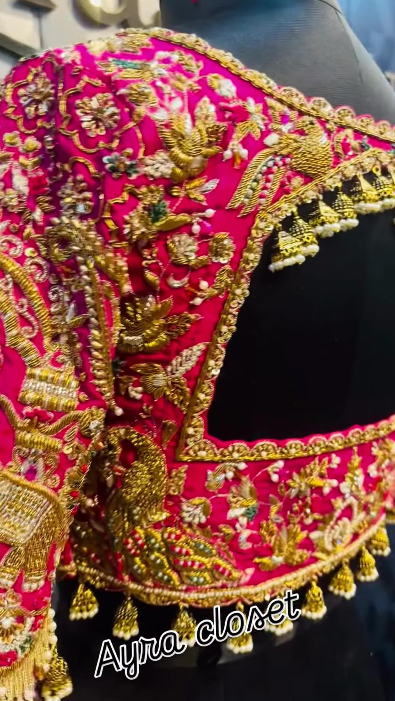 Heavy pink bridal blouse sleeve with rich maggam work embroidery