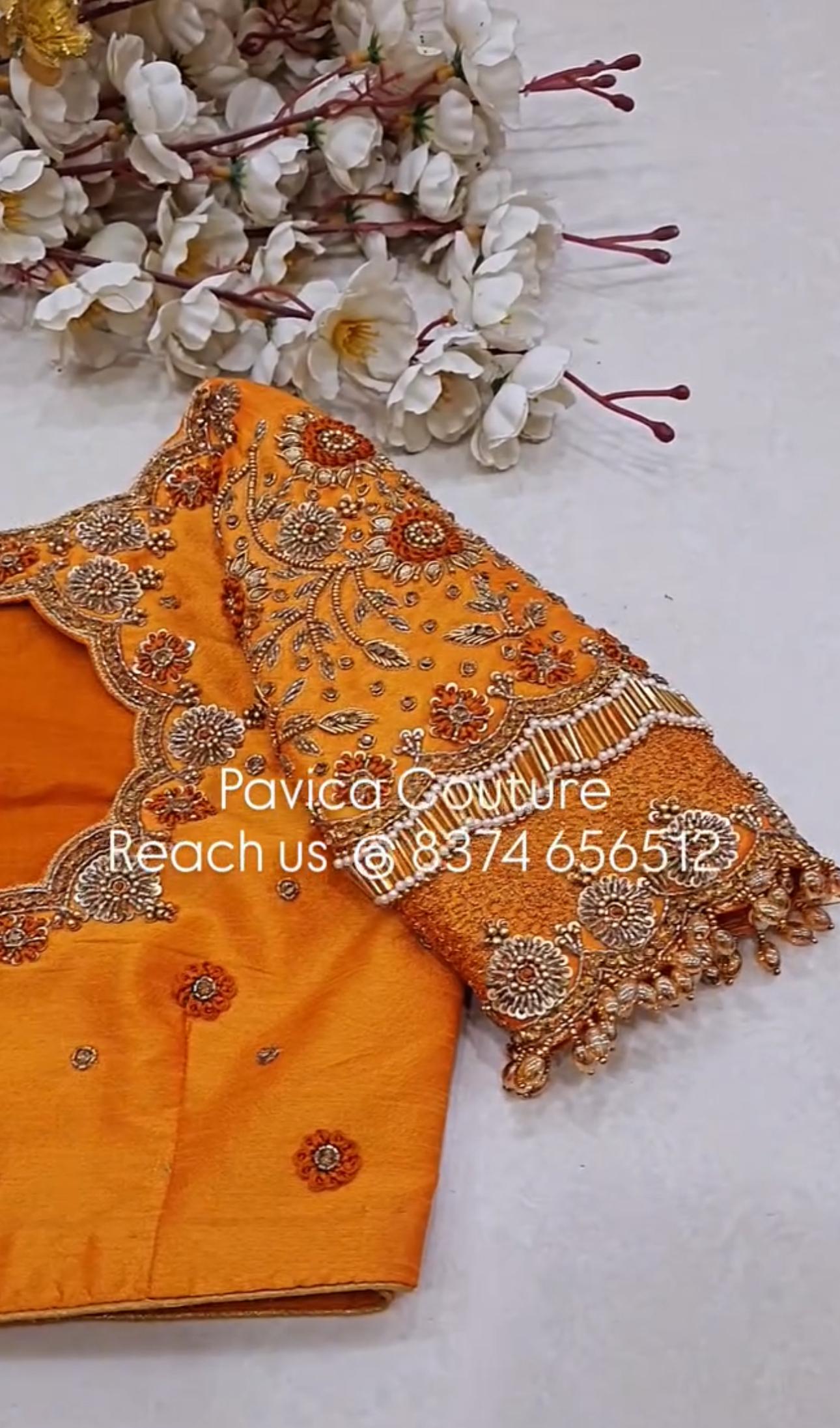 Orange bridal designer blouse with maggam embroidery from Pavica's Couture Hyderabad