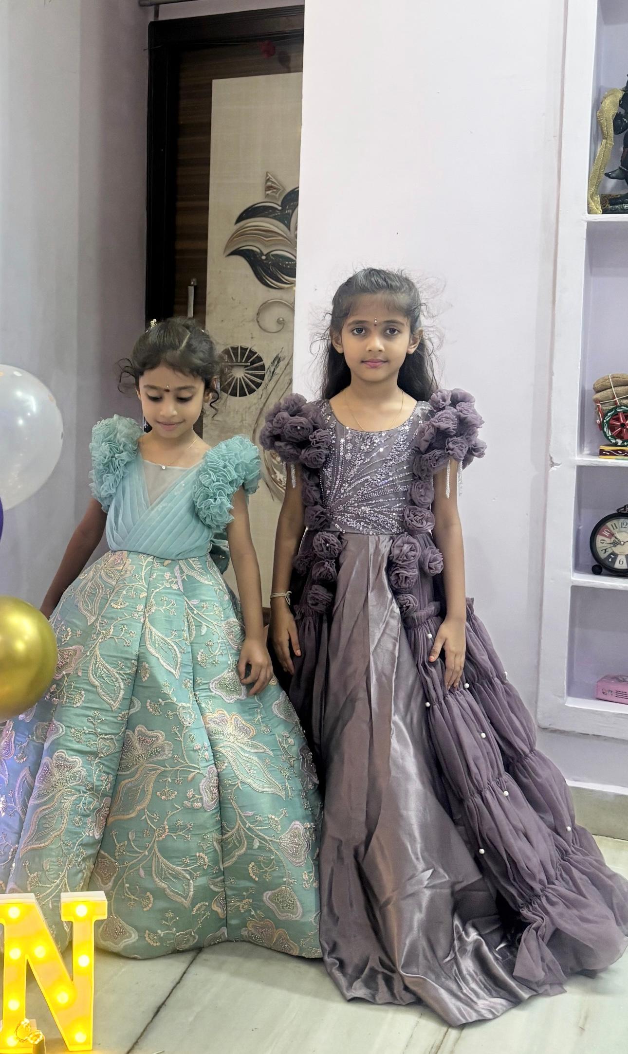 Girls' traditional gowns with ruffled shoulders and embellished skirts — Kids Birthday Party Wear Dress Design