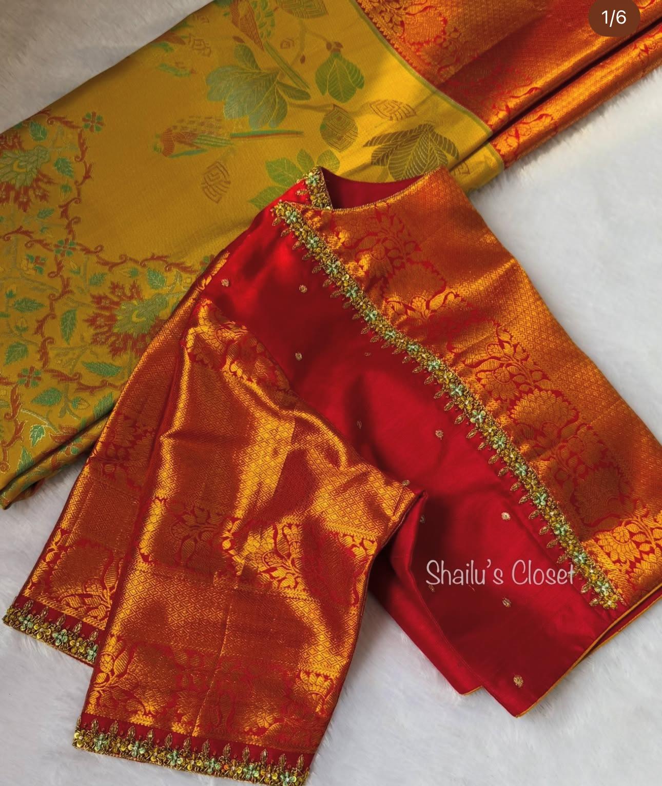 Bright orange silk blouse with traditional border detailing, suitable for festive and cultural occasions.